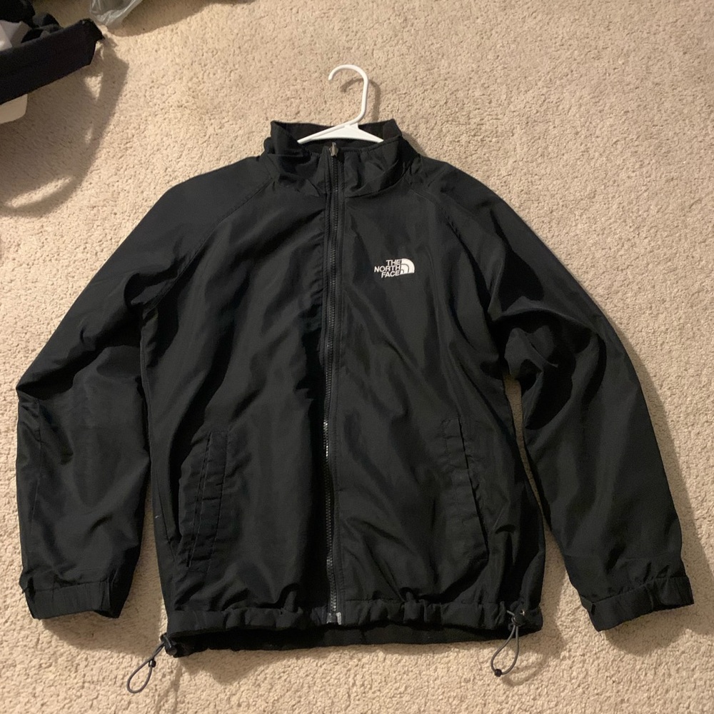 Reversible black North face jacket.